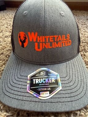 Whitetails Unlimited Black/Gray Trucker Hat with Hunter Orange Logo